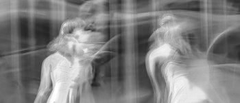 Dancers. Photo by Hulki Okan Tabak on Unsplash - (cropped and decolorized)